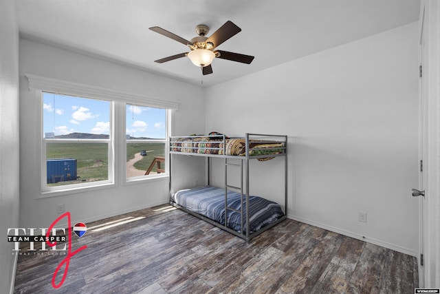 67 Monument Creek Rd, Hanna, WY 82327 - bedroom featuring wood finished floors and a ceiling fan