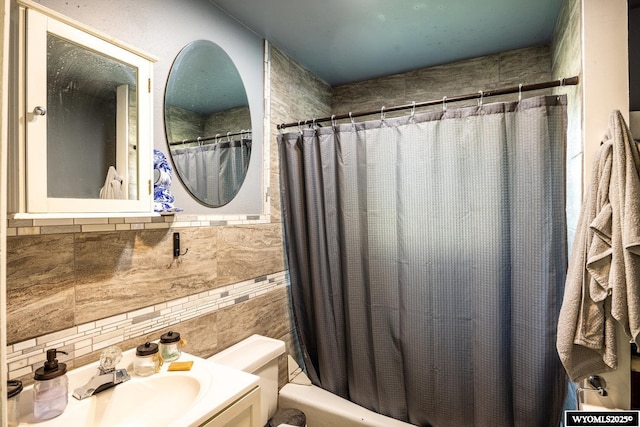 1534 Spaulding St, Sheridan, WY 82801 - full bathroom featuring tile walls, shower / bath combination with curtain, and vanity
