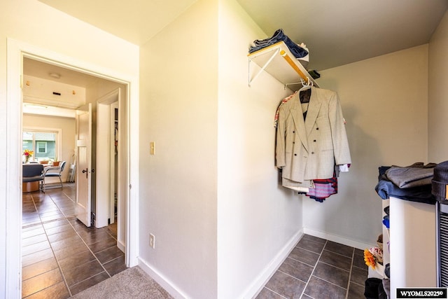 1534 Spaulding St, Sheridan, WY 82801 - walk in closet with dark tile patterned flooring