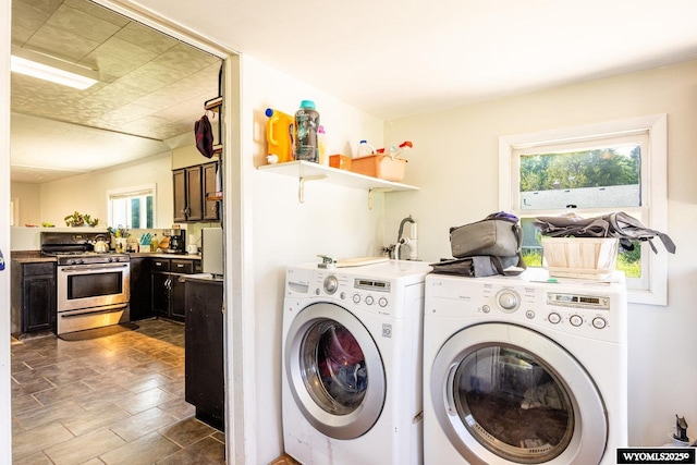 1534 Spaulding St, Sheridan, WY 82801 - washroom with washing machine and dryer and stone finish floors