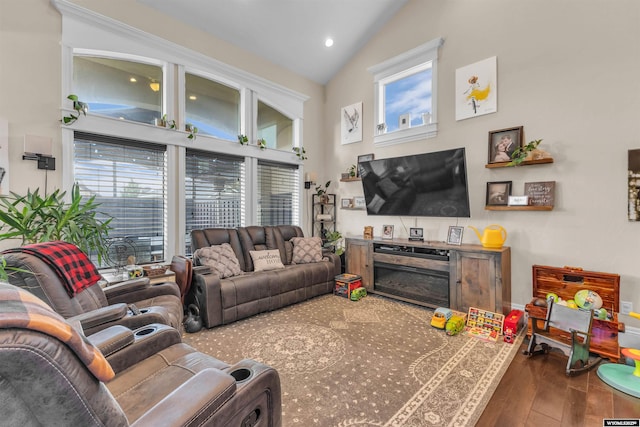 3308 Brickyard Ave, Rock Springs, WY 82901 - living area featuring healthy amount of natural light, wood finished floors, high vaulted ceiling, and recessed lighting