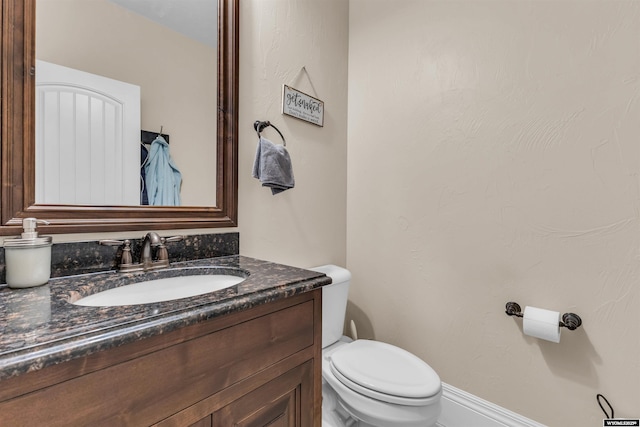 3308 Brickyard Ave, Rock Springs, WY 82901 - half bathroom featuring vanity and toilet