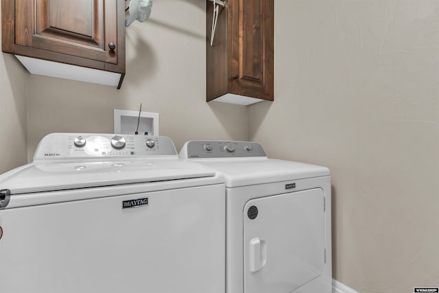 3308 Brickyard Ave, Rock Springs, WY 82901 - laundry area featuring washer and dryer and cabinet space