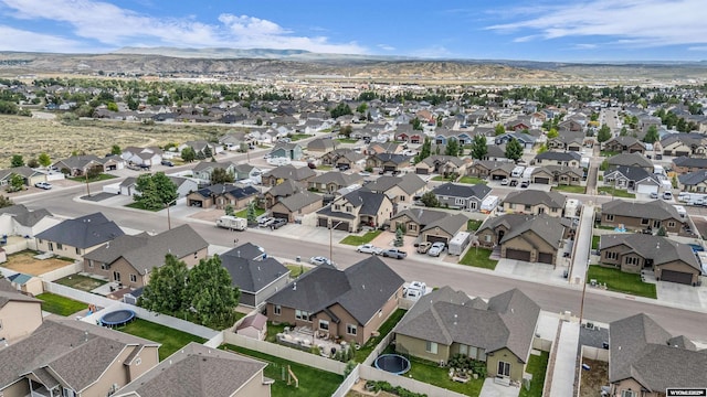 3308 Brickyard Ave, Rock Springs, WY 82901 - aerial view of property and surrounding area featuring nearby suburban area and a mountainous background