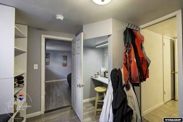 2634 Hanway Ave, Casper, WY 82604 - hallway with baseboards and wood finished floors