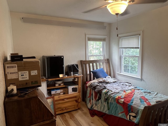 2617 E B St, Torrington, WY 82240 - bedroom featuring light wood-type flooring and ceiling fan