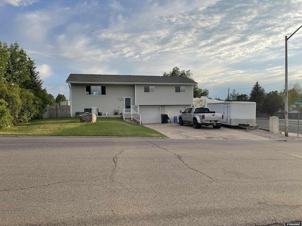 479 Twin Ridge Ave, Evanston, WY 82930 - view of front of house with a garage and driveway