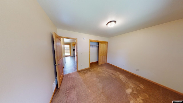 418 Spire Dr, Riverton, WY 82501 - unfurnished bedroom with light carpet and a closet