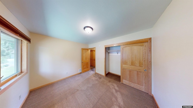 418 Spire Dr, Riverton, WY 82501 - unfurnished bedroom with light carpet and a closet