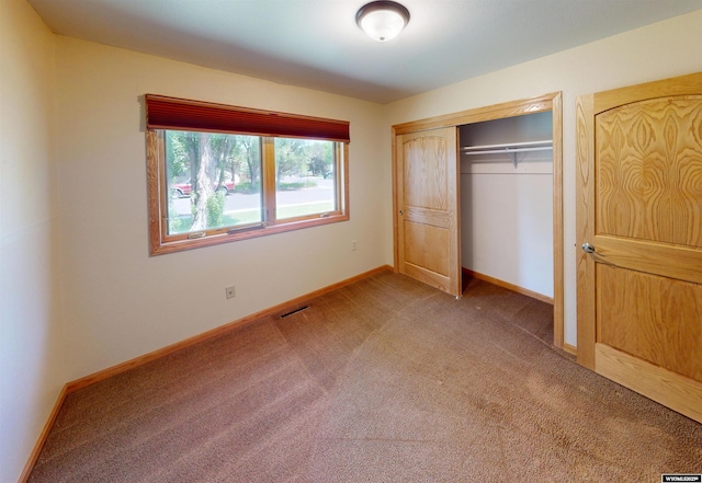 418 Spire Dr, Riverton, WY 82501 - unfurnished bedroom with light carpet and a closet