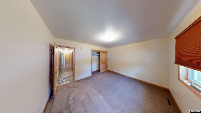 418 Spire Dr, Riverton, WY 82501 - unfurnished bedroom with light colored carpet and a closet