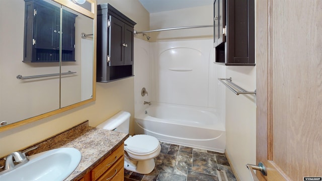 418 Spire Dr, Riverton, WY 82501 - bathroom featuring stone finish flooring, vanity, and bathing tub / shower combination
