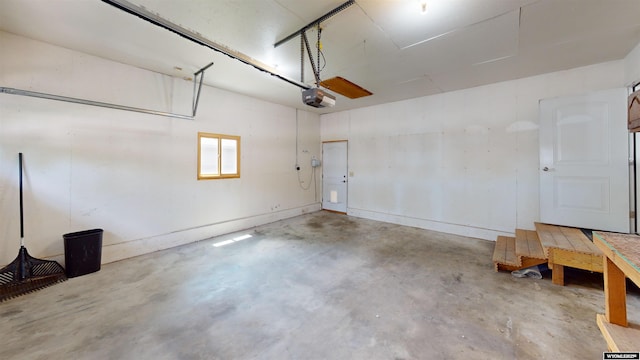 418 Spire Dr, Riverton, WY 82501 - garage featuring a garage door opener