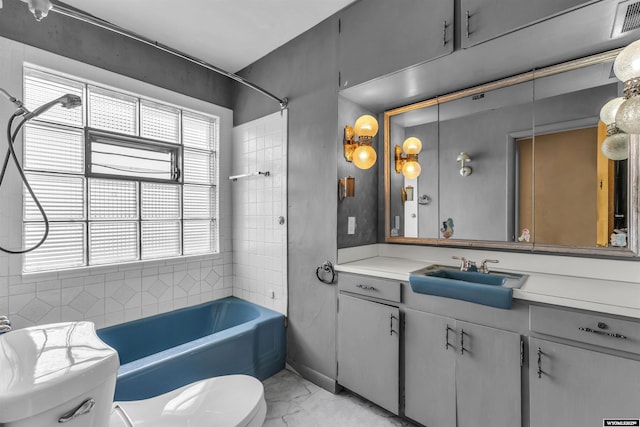 922 New Hampshire St, Rock Springs, WY 82901 - bathroom featuring marble finish floors, bathtub / shower combination, and vanity