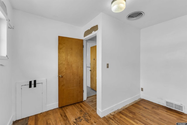 922 New Hampshire St, Rock Springs, WY 82901 - spare room with wood finished floors and baseboards