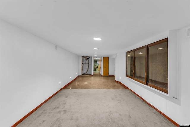 922 New Hampshire St, Rock Springs, WY 82901 - carpeted spare room featuring baseboards and recessed lighting