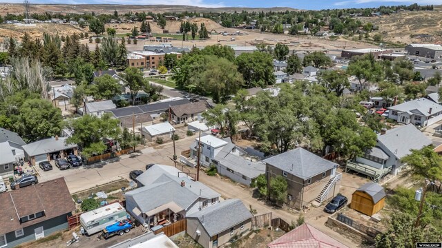 922 New Hampshire St, Rock Springs, WY 82901 - aerial perspective of suburban area with a mountain backdrop