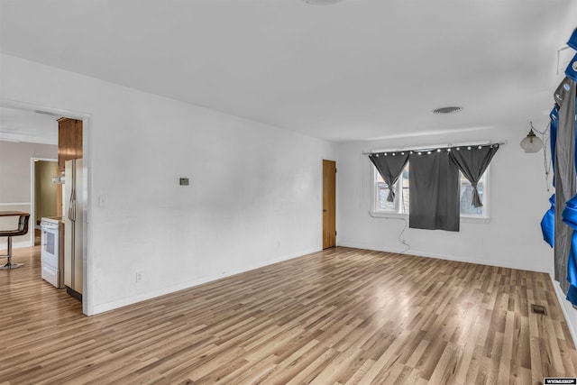 922 New Hampshire St, Rock Springs, WY 82901 - unfurnished room with wood finished floors and baseboards