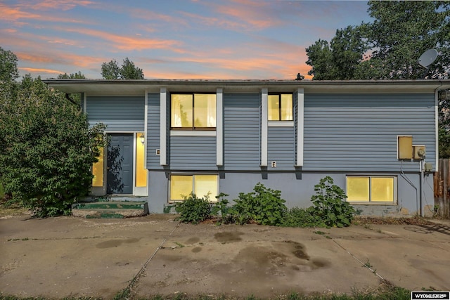 301 Cottonwood St, Evanston, WY 82930 - view of front of house featuring a patio and stucco siding