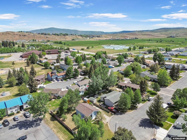 301 Cottonwood St, Evanston, WY 82930 - aerial perspective of suburban area with a mountainous background