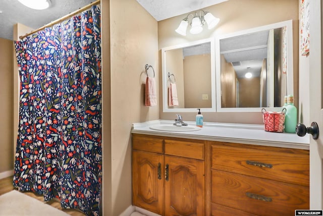 301 Cottonwood St, Evanston, WY 82930 - full bathroom featuring vanity and a shower with curtain