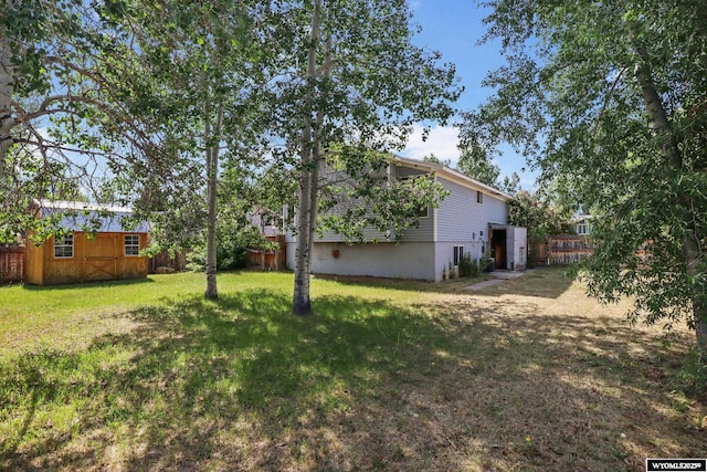 301 Cottonwood St, Evanston, WY 82930 - view of yard featuring an outdoor structure