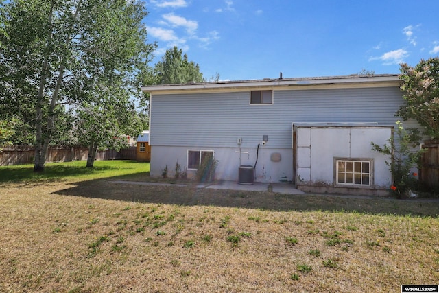 301 Cottonwood St, Evanston, WY 82930 - rear view of house featuring a patio