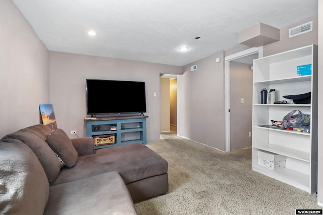 301 Cottonwood St, Evanston, WY 82930 - living area featuring carpet floors and recessed lighting