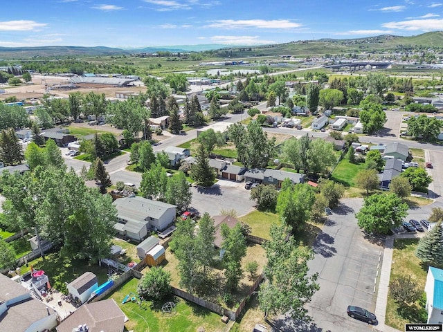 301 Cottonwood St, Evanston, WY 82930 - aerial view of residential area with a mountain backdrop