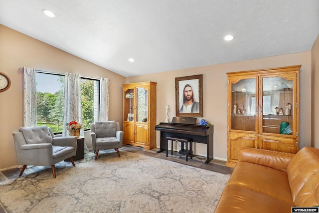 301 Cottonwood St, Evanston, WY 82930 - living area with lofted ceiling, recessed lighting, and wood finished floors