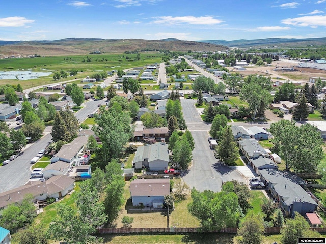301 Cottonwood St, Evanston, WY 82930 - aerial perspective of suburban area featuring mountains