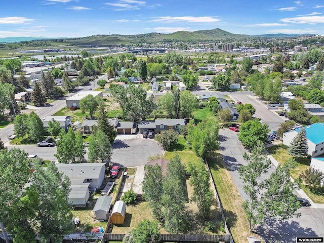 301 Cottonwood St, Evanston, WY 82930 - aerial perspective of suburban area with a mountain backdrop