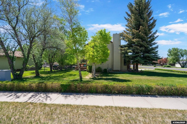 606 Herschler Ave, Evanston, WY 82930 - view of side of home featuring a yard