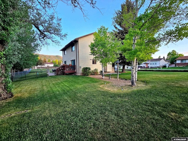 606 Herschler Ave, Evanston, WY 82930 - view of yard featuring a deck