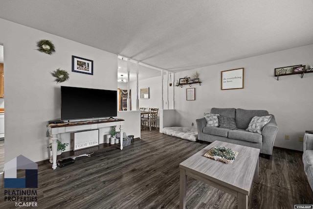 3440 E 18th St, Casper, WY 82609 - living area with wood finished floors and a textured ceiling