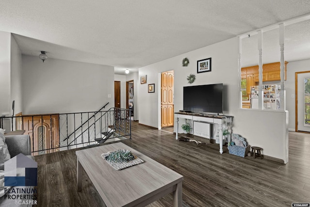 3440 E 18th St, Casper, WY 82609 - living room with wood finished floors and a textured ceiling