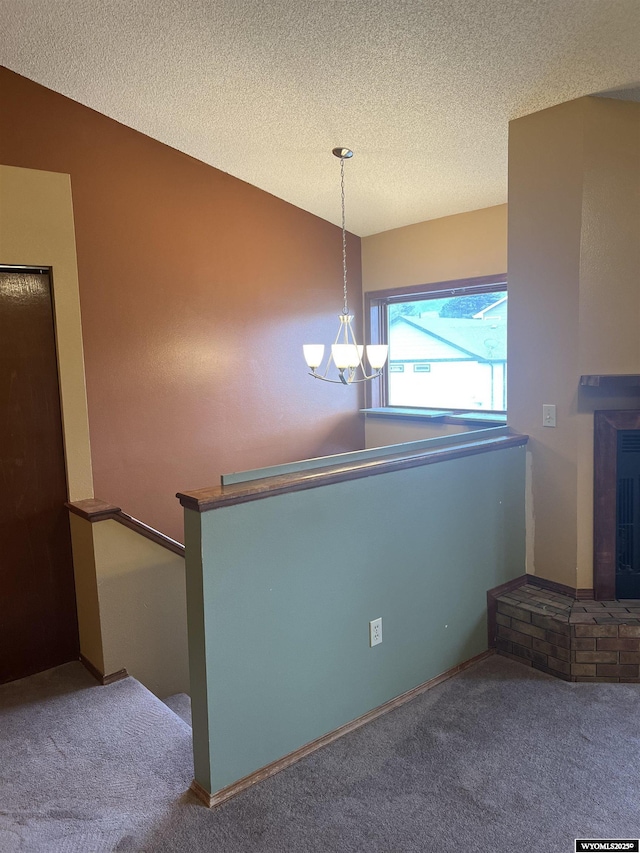 6358 Buckboard Rd, Casper, WY 82604 - unfurnished dining area with carpet and a textured ceiling