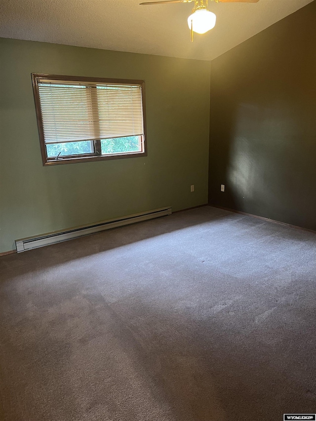 6358 Buckboard Rd, Casper, WY 82604 - empty room with a baseboard heating unit, carpet, and a ceiling fan