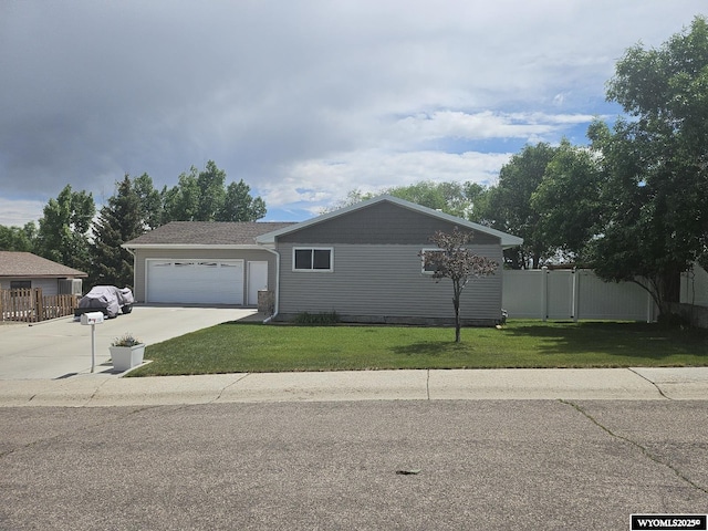 1150 Park View Dr, Green River, WY 82935 - view of front of home featuring driveway and an attached garage