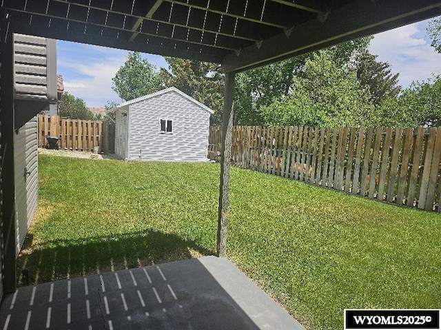 1150 Park View Dr, Green River, WY 82935 - fenced backyard with an outdoor structure