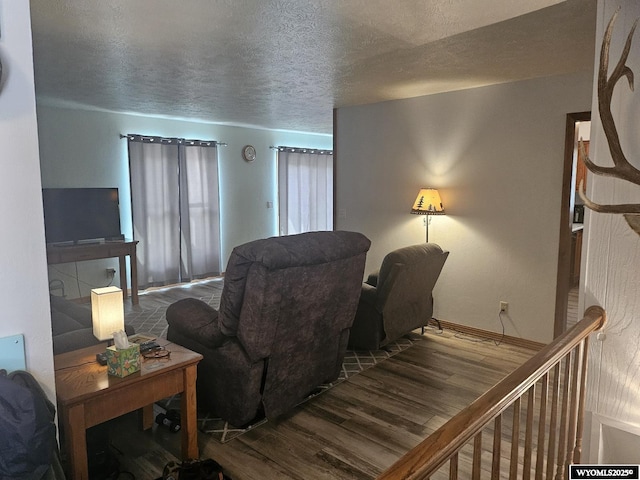 1150 Park View Dr, Green River, WY 82935 - living area with wood finished floors and a textured ceiling