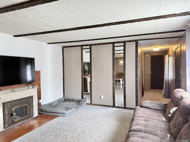 601 Diamondville Ave, Diamondville, WY 83116 - carpeted living room with a tile fireplace