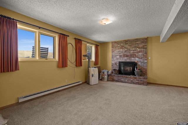 4450 S Skyline Rd, Casper, WY 82604 - unfurnished living room with a baseboard radiator, a textured ceiling, carpet floors, and a wood stove