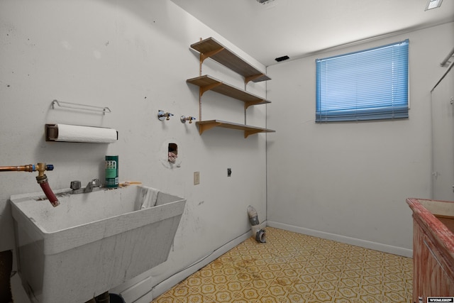 4450 S Skyline Rd, Casper, WY 82604 - laundry area featuring baseboards and hookup for an electric dryer