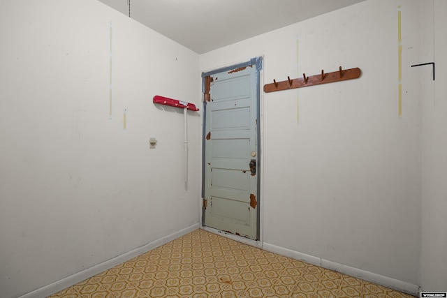 4450 S Skyline Rd, Casper, WY 82604 - spare room featuring baseboards and light floors