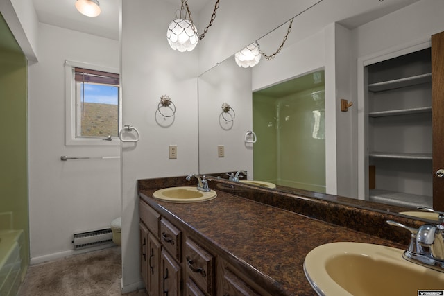 4450 S Skyline Rd, Casper, WY 82604 - full bathroom featuring a shower, double vanity, a bathtub, and a baseboard heating unit