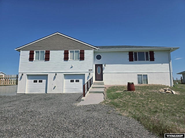 7866 Scorpion Way, Evansville, WY 82636 - view of front of property with an attached garage and driveway