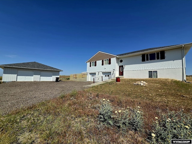 7866 Scorpion Way, Evansville, WY 82636 - view of front of house featuring a detached garage