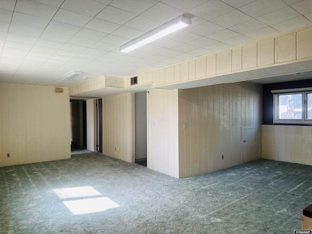 829 Belinda Dr, Riverton, WY 82520 - carpeted spare room with wooden walls
