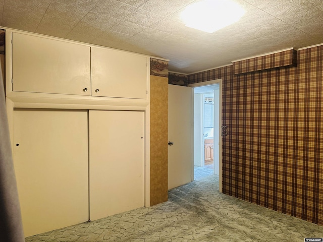 829 Belinda Dr, Riverton, WY 82520 - unfurnished bedroom featuring carpet floors and a closet